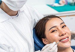 Woman smiling in the dental chair