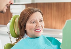 Woman smiling in the dental chair